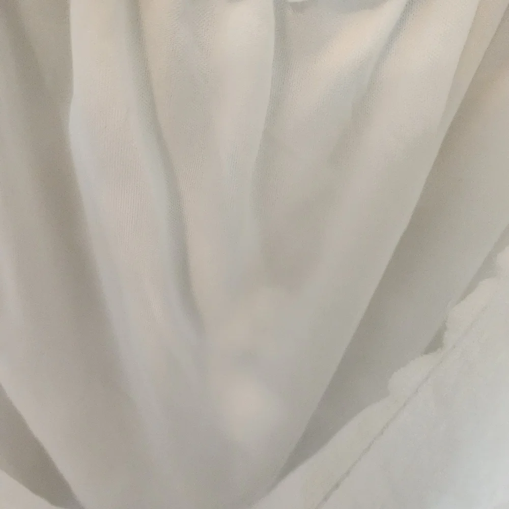 White polka dot bell sleeve dress. Stretchy collar that can be worn off shoulder - Picture 4 of 11